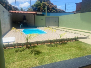 Casa com 4 Suites Prox Guarajuba